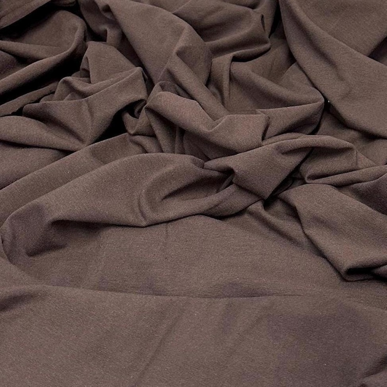 Tecido de malha jersey de algodão e elastano ultra macio com elasticidade em 4 direções, vendido por metro, 200 g/m², para body modelador. Cor natural. Espresso