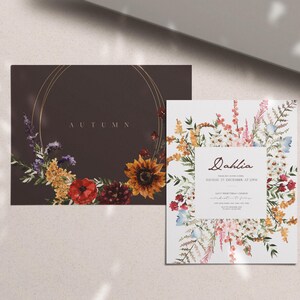 May include: Two floral themed cards. The first card has a dark brown background with a gold circle and the word "AUTUMN" in white text. The second card has a white background with a floral border and the text "Dahlia" in brown text.