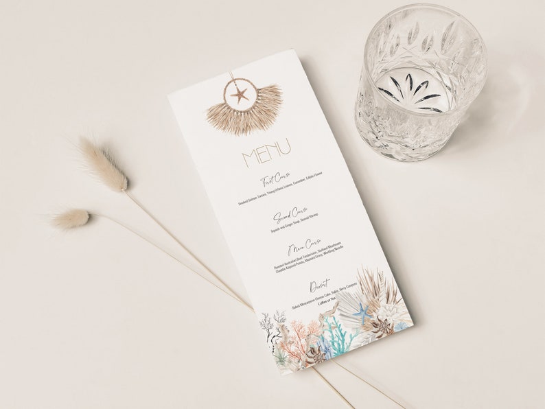 May include: A white menu with a brown and beige dreamcatcher design at the top. The menu lists "MENU" in black text and has the following sections: "First Course", "Second Course", "Main Course", and "Dessert". The bottom of the menu features a watercolor illustration of coral, seashells, and starfish.
