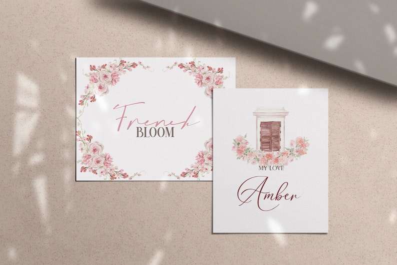 May include: Two printable cards with floral borders. The first card says "French BLOOM" in pink script. The second card has a watercolor illustration of a window with a floral border and says "My Love Amber" in pink script.
