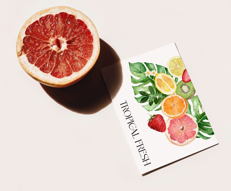 May include: A white card with the text "TROPICAL FRESH" in black lettering. The card features a watercolor illustration of a variety of tropical fruits, including a grapefruit, lemon, orange, kiwi, and strawberry, surrounded by green leaves.