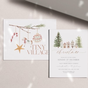 May include: Two Christmas-themed cards. One features watercolor illustrations of holiday ornaments hanging from a branch, with the text "Tiny Village." The other card has a Christmas tree and houses with the word "Christmas."