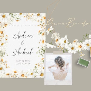 May include: A wedding invitation with a white floral border and the text "Wedding Invitation" "Andrea & Michael" "May 23, 2023" "Cafe Flower".