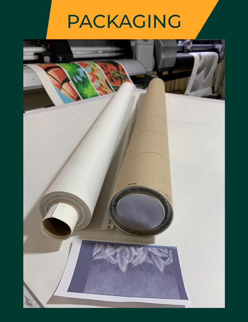 May include: A white canvas print rolled up and ready to be shipped in a brown cardboard tube. The print features a tropical leaf design.