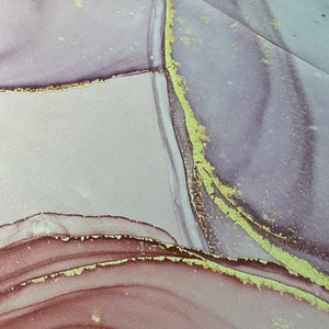 May include: Abstract art painting with a purple, pink, and gold color scheme. The painting has a textured surface and features a variety of shapes and lines.