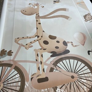 May include: A brown and white giraffe riding a bicycle with a brown balloon in the background. The giraffe is wearing a brown scarf and has brown spots. The bicycle has brown wheels and a brown frame.