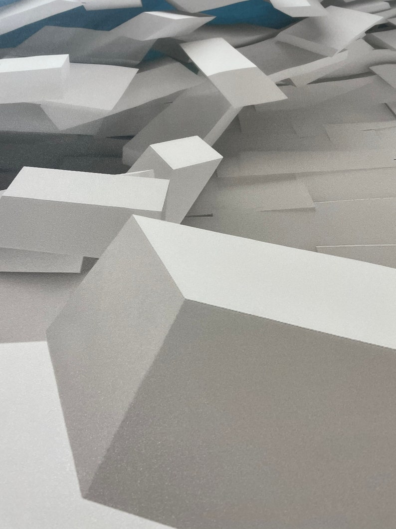 May include: A close-up of a white geometric shape with a textured surface. The shape is made up of multiple smaller shapes that are arranged in a random pattern.