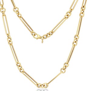 May include: A gold-colored necklace with a paperclip chain design. The necklace features elongated rectangular links connected by smaller, textured links. The clasp is visible at the top, and the necklace is displayed against a white background.