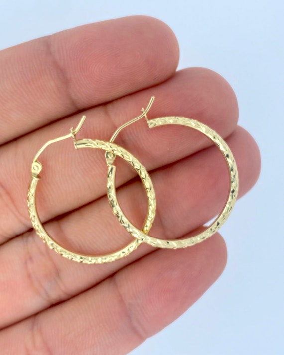 Gold round earrings with price deals
