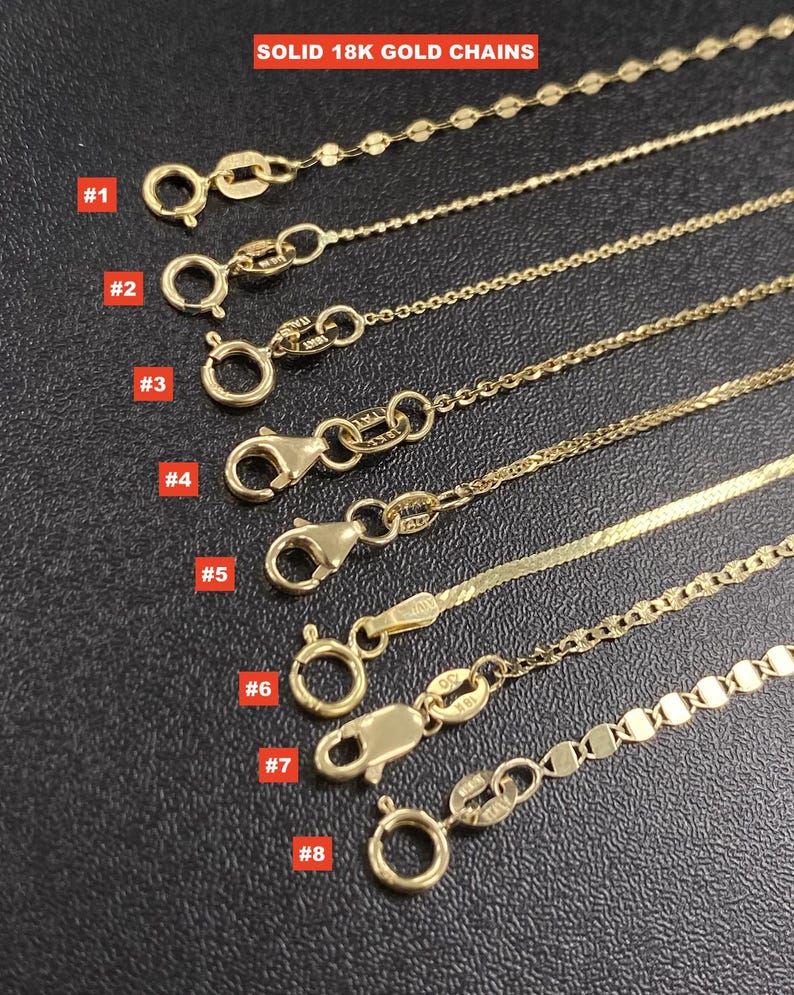 May include: Eight solid 18K gold chain necklaces are shown, each with a unique chain design and clasp. The chains are presented on a dark surface. The text "SOLID 18K GOLD CHAINS" is visible at the top of the image.