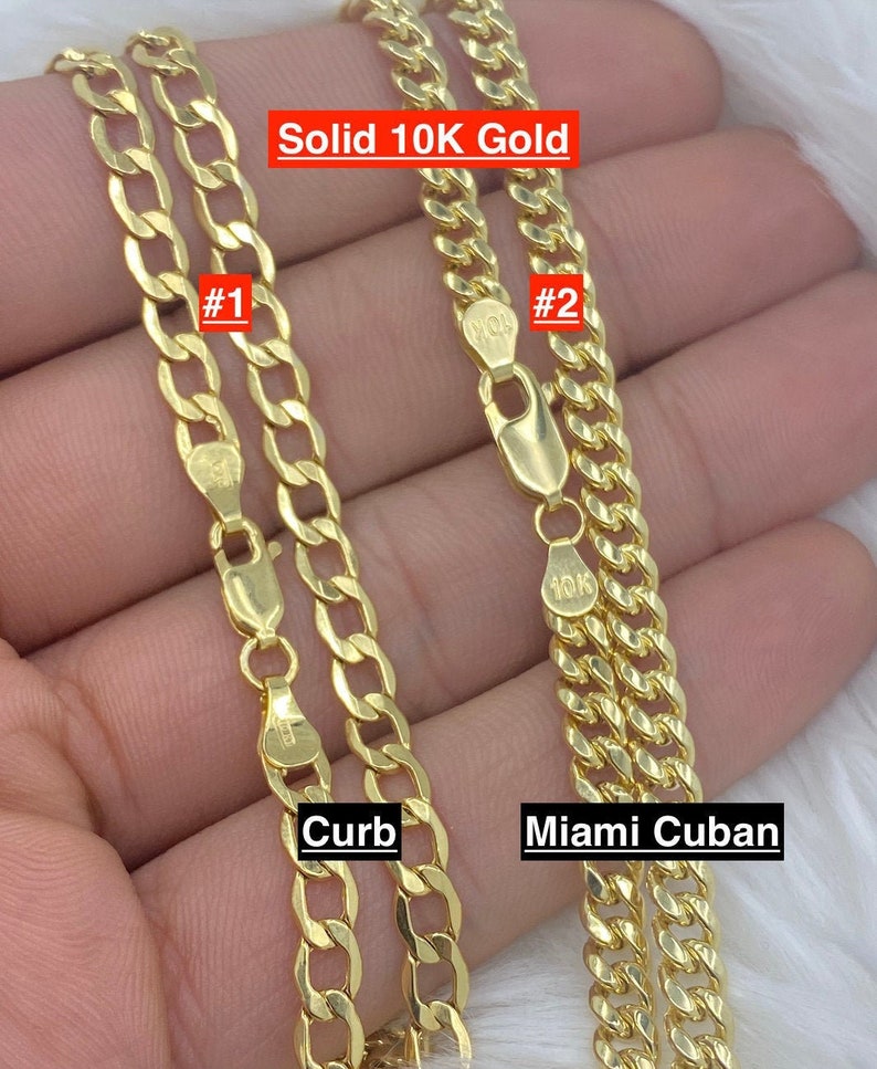 May include: Two gold chains, one curb chain and one Miami Cuban chain, both labeled with "10K" and numbered #1 and #2. The text "Solid 10K Gold" is at the top of the image.