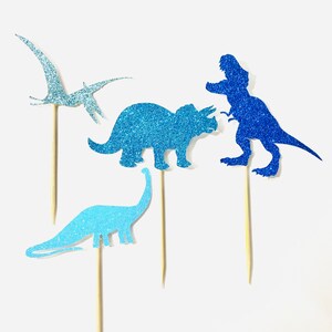 Blue dinosaur cupcake toppers