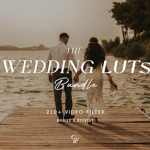 May include: A couple stands on a wooden dock overlooking a lake. The text "THE WEDDING LUTs Bundle" is displayed in white text on a black background. The text "210+ VIDEO FILTER MOBILE & DESKTOP" is displayed in white text on a black background. The text "CVR" is displayed in white text on a black background.