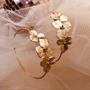 Creole encrusted with gold flower, flower creole