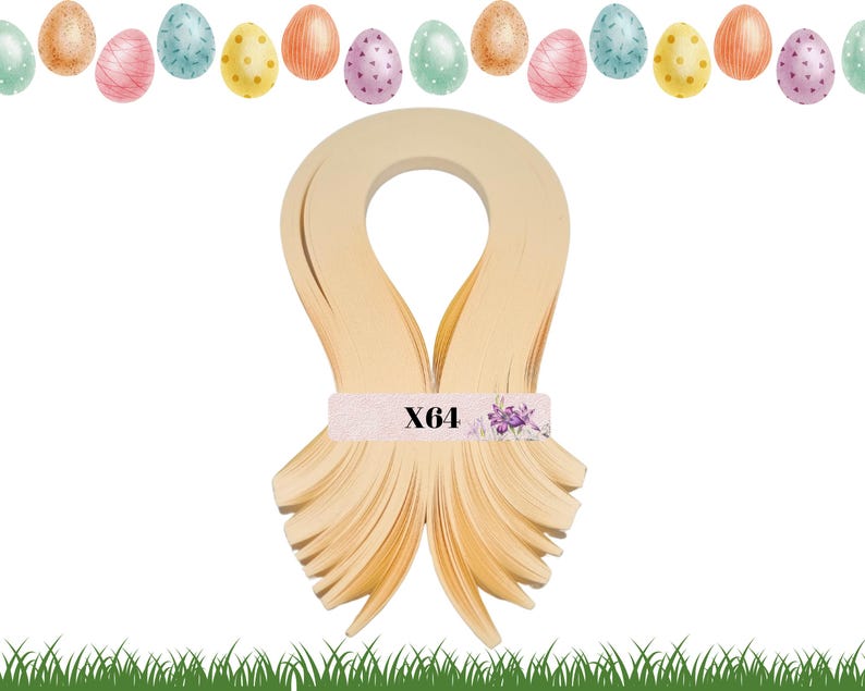 May include: A pack of 64 strips of light yellow paper quilling strips. The strips are folded in half and arranged in a fan shape. The pack is labeled "X64".
