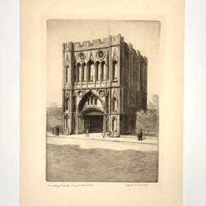 May include: A black and white etching on paper depicting a stone abbey gateway with crenelated battlements, pointed arches, and intricate gothic architectural details. Small figures stand at the base of the structure, which is titled St. Albans Abbey Gateway.