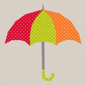 May include: A colourful umbrella with red, green and orange polka dots. The umbrella is closed and has a green handle.