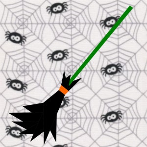 May include: A black witch's broom with an orange stripe on the handle, flying over a white background with a repeating pattern of black spiders and gray spiderwebs.