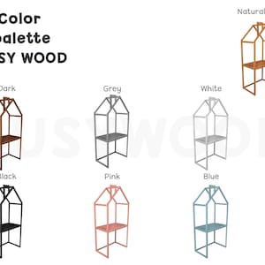 K&ouml;nnte beinhalten: Ein Satz von 8 Holzregalen in verschiedenen Farben, darunter Natur, Dunkel, Grau, Wei&szlig;, Schwarz, Rosa und Blau. Die Regale haben die Form eines Hauses und zwei Regalb&ouml;den. Die Regale sind mit der Farbe des Holzes beschriftet.