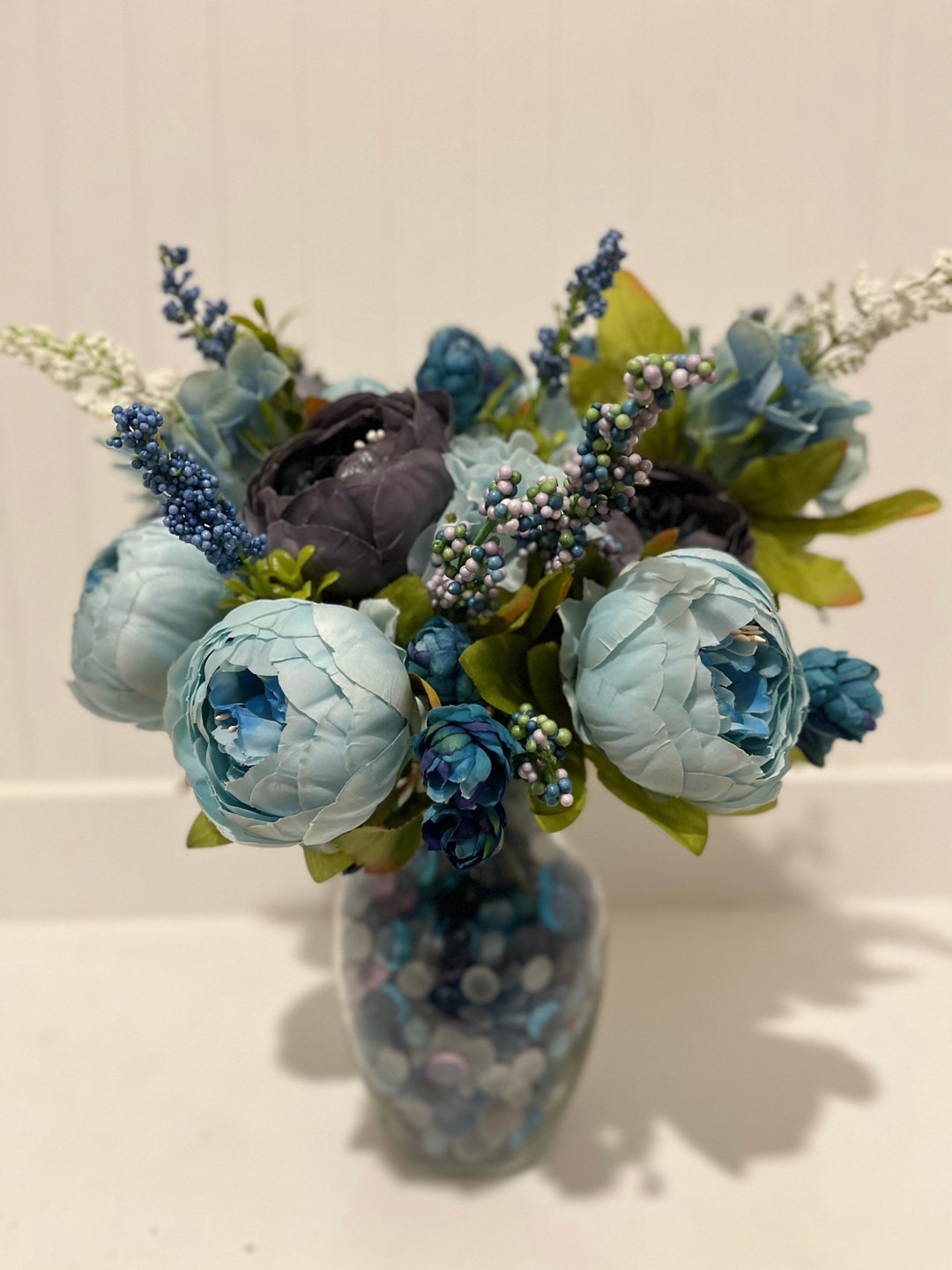 Beautiful Shades of Blue Flowers in a Clear Glass Vase, Filled With ...