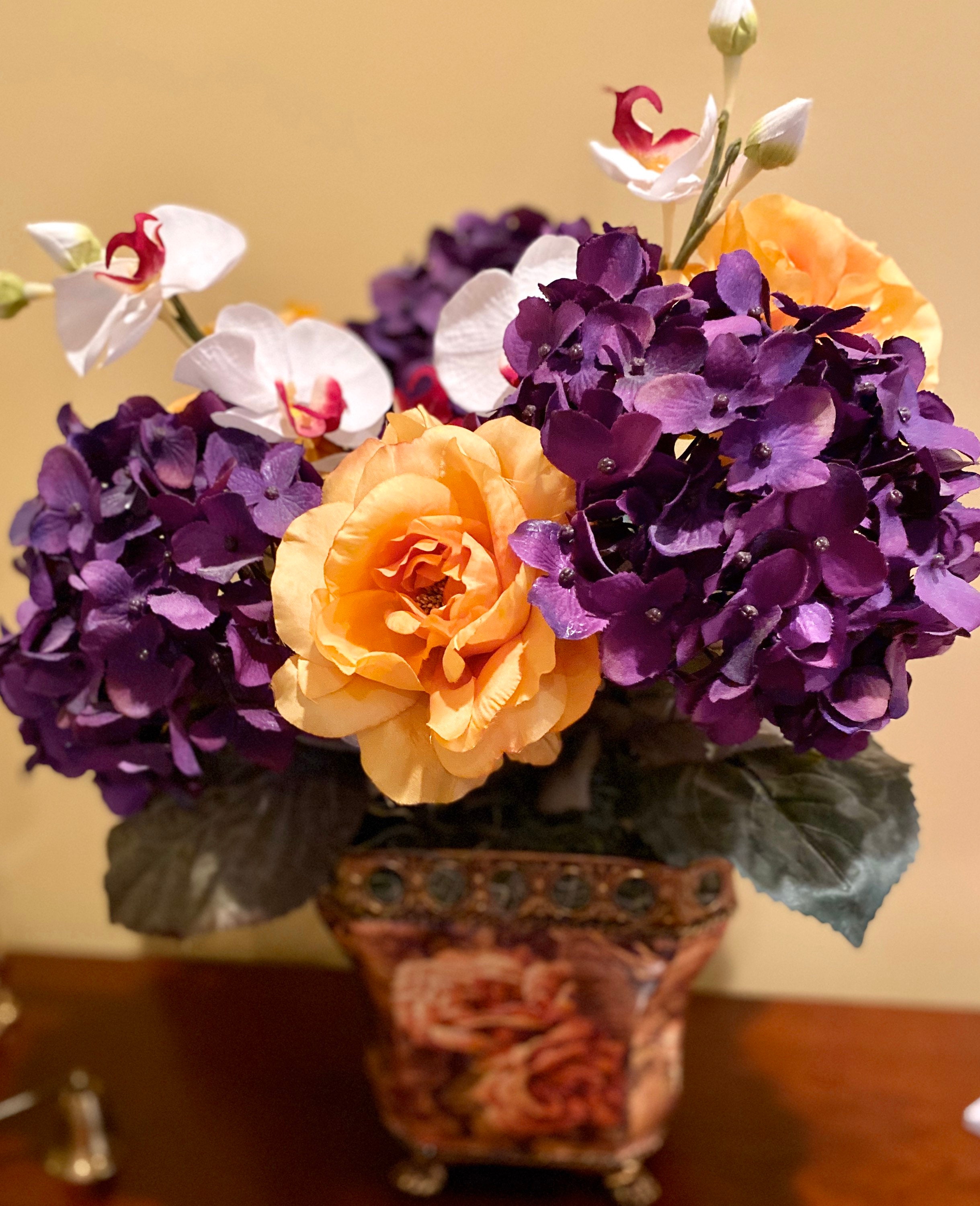 A silk flower arrangement in gemstone colors Purple and Gold. Etsy