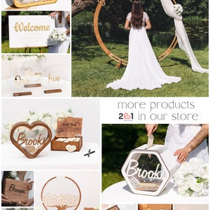 May include: A collection of wooden wedding decor items, including a welcome sign, guest book, and card boxes. The items feature personalized names and dates, with a rustic and elegant design. The color palette includes natural wood tones and white accents.