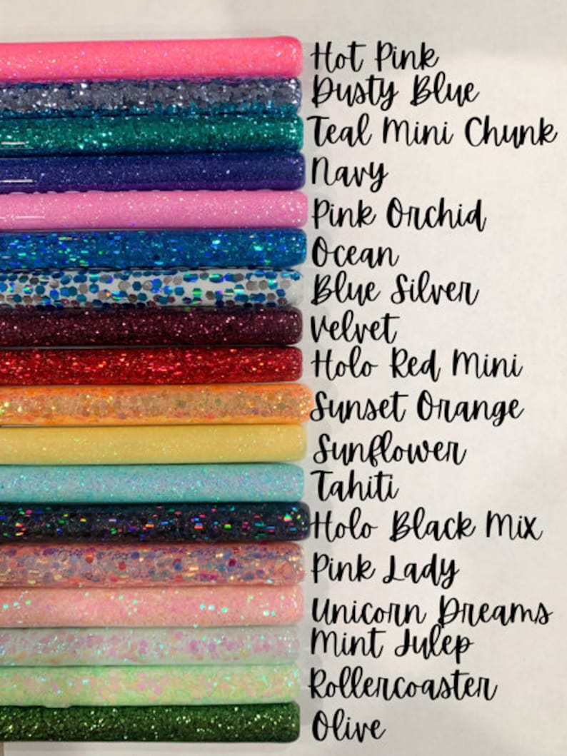 May include: A collection of 16 glitter-filled tubes in various colors, including hot pink, dusty blue, teal, navy, pink orchid, ocean, blue silver, velvet, holo red, sunset orange, sunflower, tahiti, holo black, pink lady, unicorn dreams, mint julep, rollercoaster, and olive.