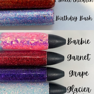 May include: Six glitter pens with black caps. The pens are labeled with the following names: I smell children, Birthday Bash, Barbie, Garnet, Grape, Glacier Fine.
