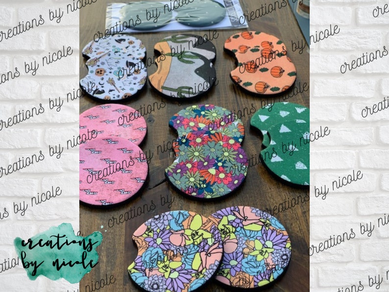 May include: A set of eight colorful, round, fabric coasters with various patterns. The coasters are made of a soft, absorbent material and are perfect for protecting surfaces from spills and scratches.