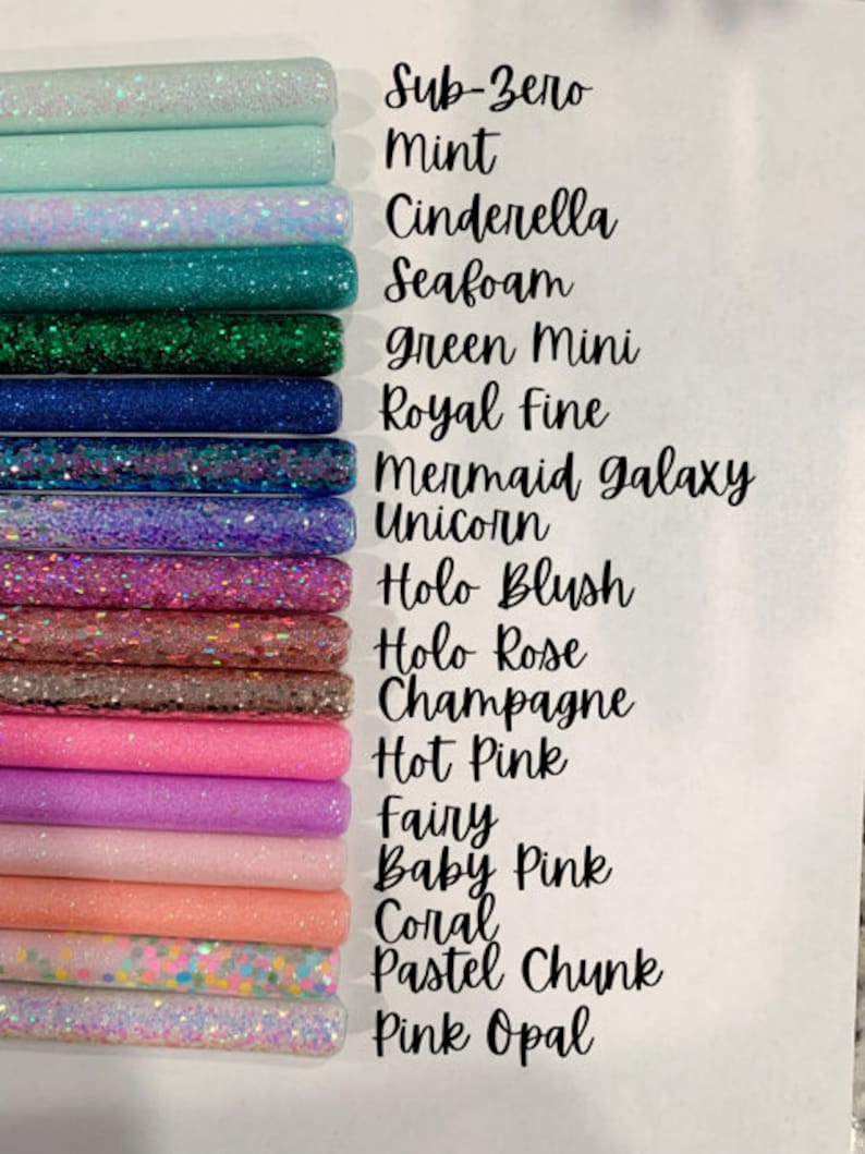 May include: A collection of 15 glitter-filled tubes, each with a different color and name. The colors include mint, seafoam, green, blue, purple, pink, and coral. The names include Sub-Zero, Mint, Cinderella, Seafoam, Green Mini, Royal Fine, Mermaid Galaxy, Unicorn, Holo Blush, Holo Rose, Champagne, Hot Pink, Fairy, Baby Pink, Coral, Pastel Chunk, and Pink Opal.