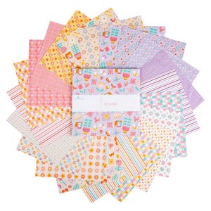 May include: A collection of colorful fabric squares arranged in a circular pattern. The fabrics feature various floral and geometric designs in shades of pink, yellow, and purple. The word "PATCHWORK" is visible on the label.