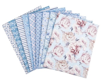 May include: A collection of ten rectangular fabric swatches arranged in a fan shape. The patterns include light blue and white floral prints, thin horizontal stripes, a blue and white plaid, and a large-scale pink and white peony floral print.