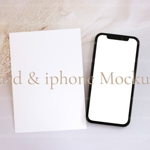 May include: A white card and a black iPhone mockup on a white background with a dried flower arrangement in the corner.