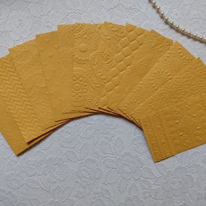 12 enveloppes de pièces en relief