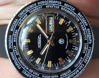 Reloj de pulsera Raketa Cities City Goroda calibre 2628 negro, vintage de la URSS con hora mundial, reloj retro negro Raketa con hora mundial.