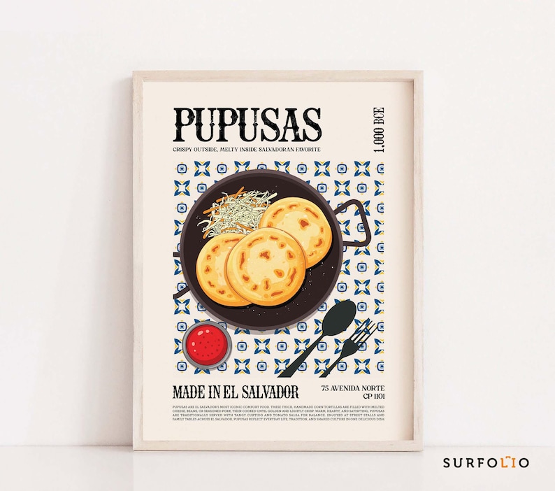 May include: A framed poster featuring a graphic illustration of pupusas, a Salvadoran dish. The image shows three golden-brown pupusas on a black plate, with a side of coleslaw and a small bowl of red sauce. Text includes "PUPUSAS" and "MADE IN EL SALVADOR."