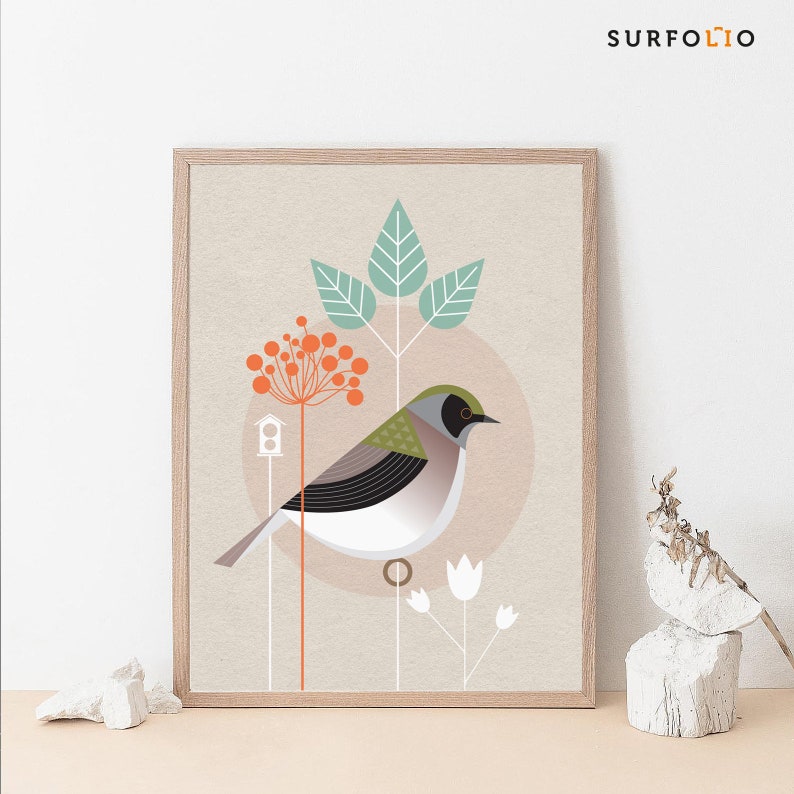 May include: A framed print of a stylized bird with green, black, and white feathers, perched on a branch with orange berries and a small birdhouse. The background is a light beige with a pale pink circle.
