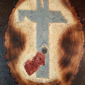Old broken Cross with fallen INRI plaque