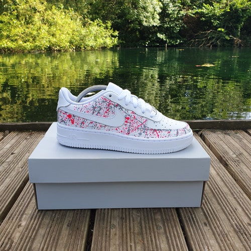 white and pink air force ones mens