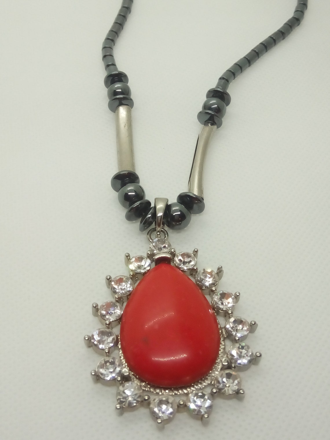 Beautiful Hematite, Coral Colored Glass Necklace With Teardrop Shaped