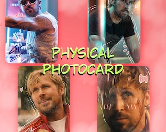 May include: A collection of four physical photocards featuring a man with blonde hair and a beard in various scenes. The cards include decorative white line art, small pink hearts, and a signature. The text PHYSICAL PHOTOCARD is centered.