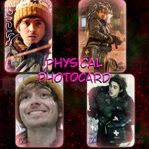May include: A rectangular physical photocard featuring four distinct images of a person. Two images show the person wearing a mustard yellow beanie, while the other two depict the person in a dark jacket carrying a medical bag with a white cross.