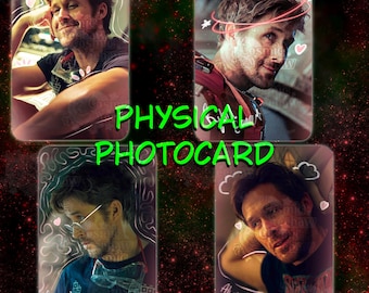 May include: Four rectangular physical photocards featuring images of a man with brown hair. The cards include white line art doodles, hearts, and the text "PHYSICAL PHOTOCARD" in green. One card shows the text "Always Muscles??" and a signature.
