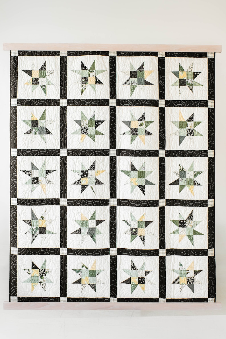 Star Quilt Pattern displayed using quilt hangers