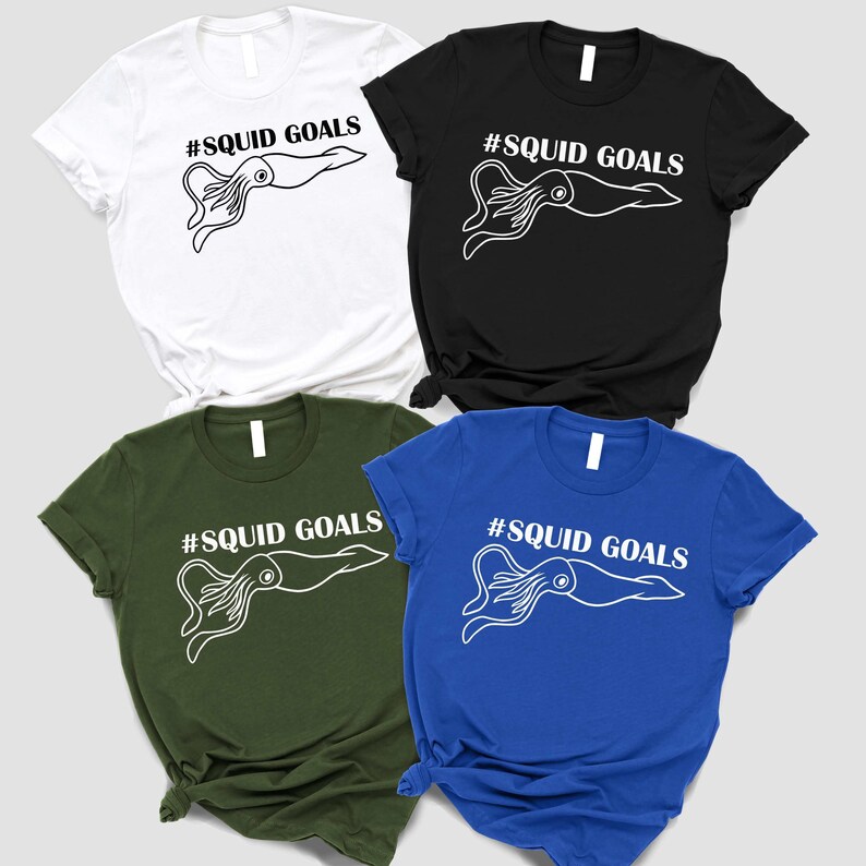 four t-shirts with the same design, featuring a squid graphic and the text "# SQUID GOALS" printed on them.