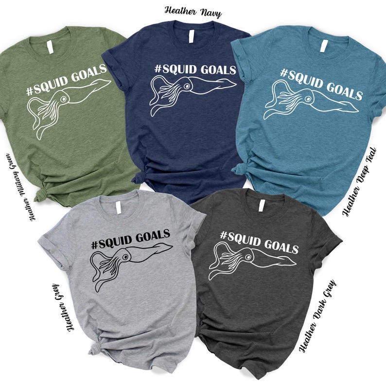 a collection of five t-shirts with the same design, featuring a squid graphic and the text "# SQUID GOALS" printed on them.