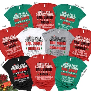 North Pole Correctional Christmas T-Shirt: Funny Holiday Crew Tee