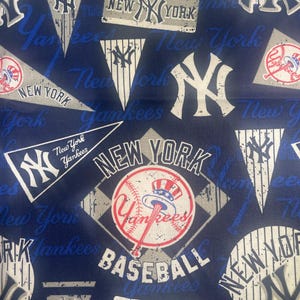 May include: A blue and white fabric with a repeating pattern of New York Yankees logos, baseballs, and the words "New York" and "Yankees".
