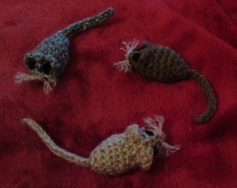 Handmade catnip mice with long lasting oomph. Built to withstand serious play from your cat.