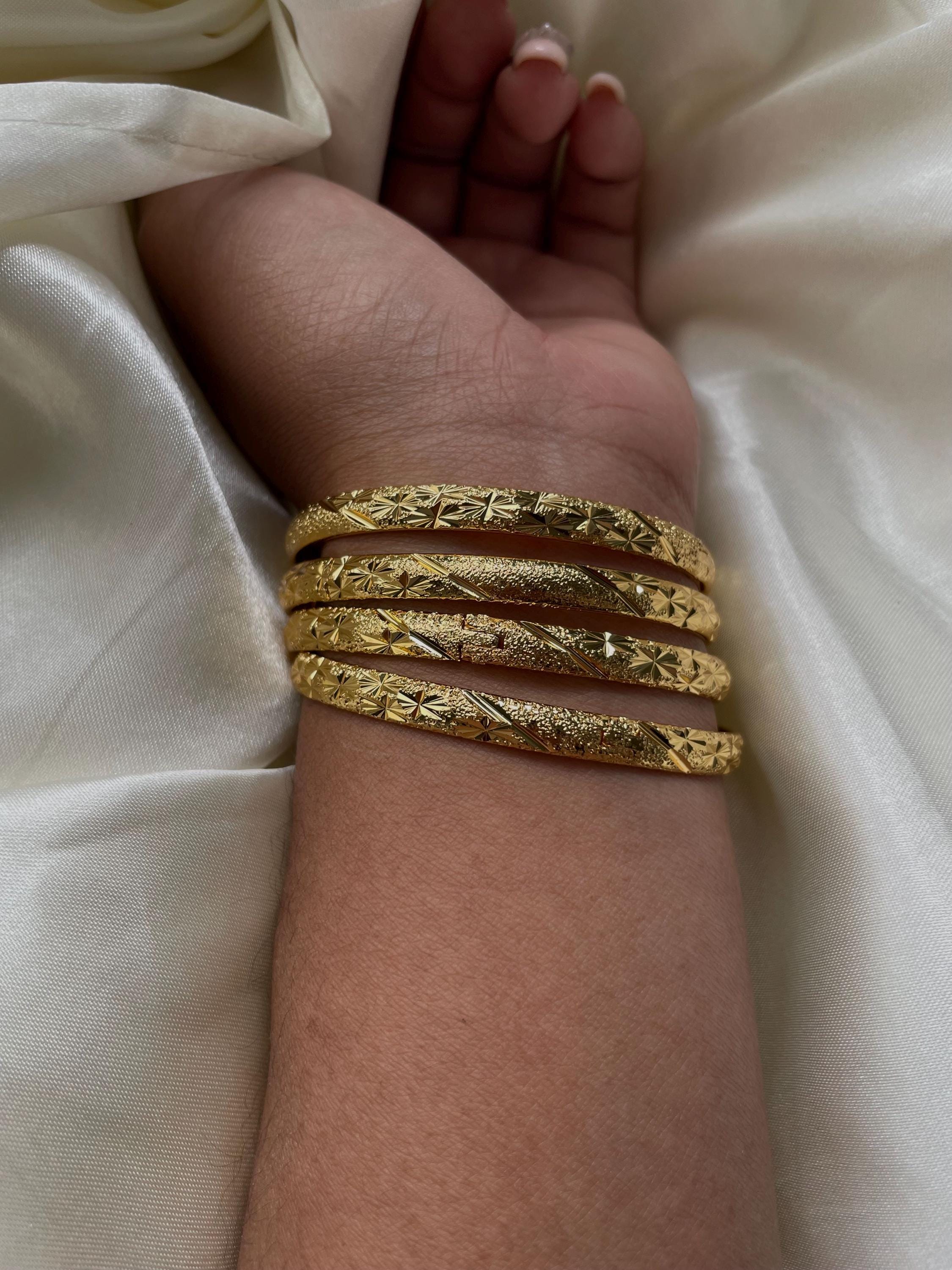 Gold bangles designs catalogue with price discount